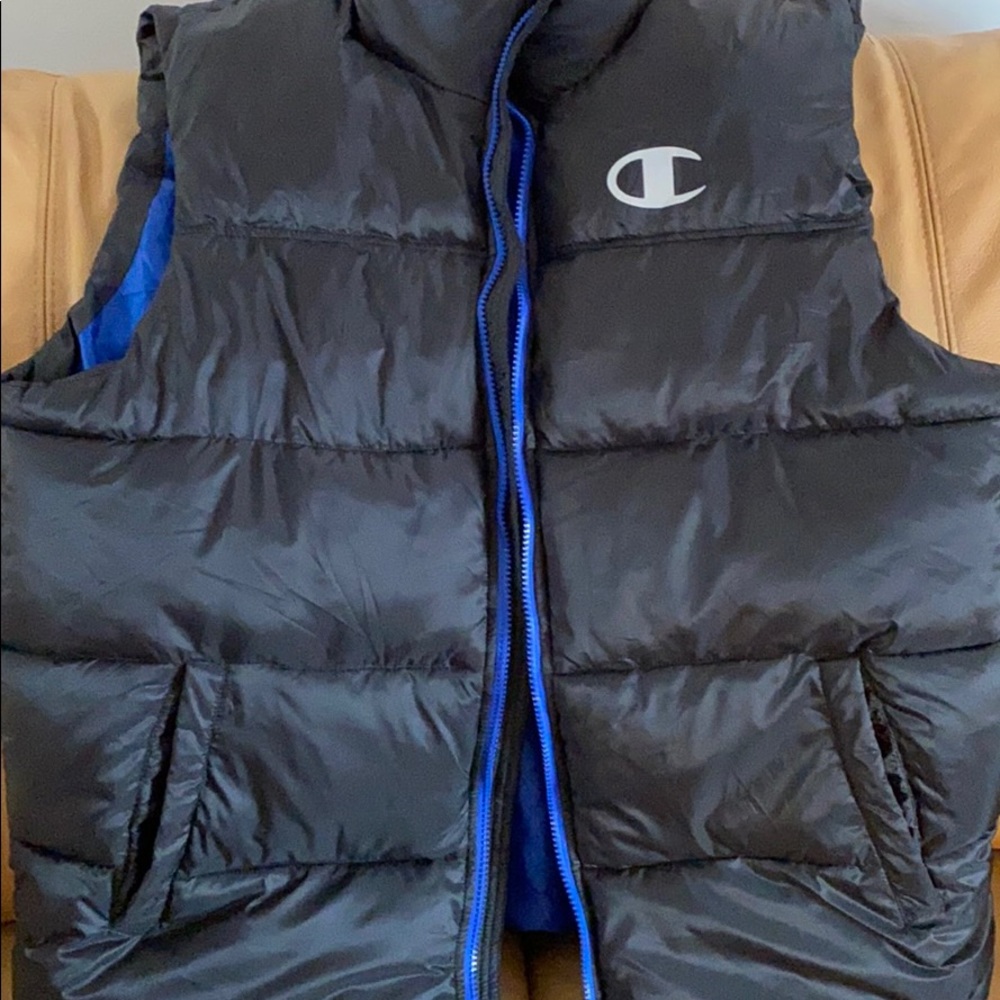 2 Men’s  Champion vest. 1. Size L and 1 size M